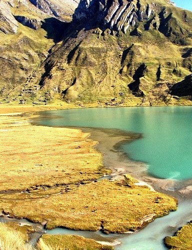 The edge of Laguna Carhuacocha on the Huayhuash Trek, Peru