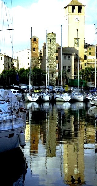 Medieval towers of Savona seen from the harbour, Liguria / Italy